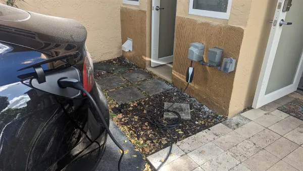 Electric vehicle charger fully installed at a residential location, ready for use, reflecting the ease of charging at home.