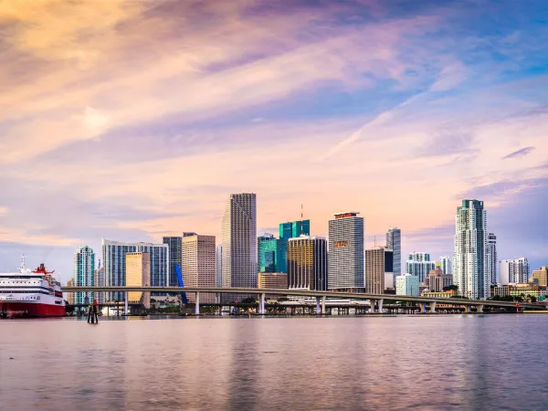 View of downtown Miami showcasing its modern skyline, symbolizing the city's commitment to supporting electric vehicles with favorable incentives and regulations.